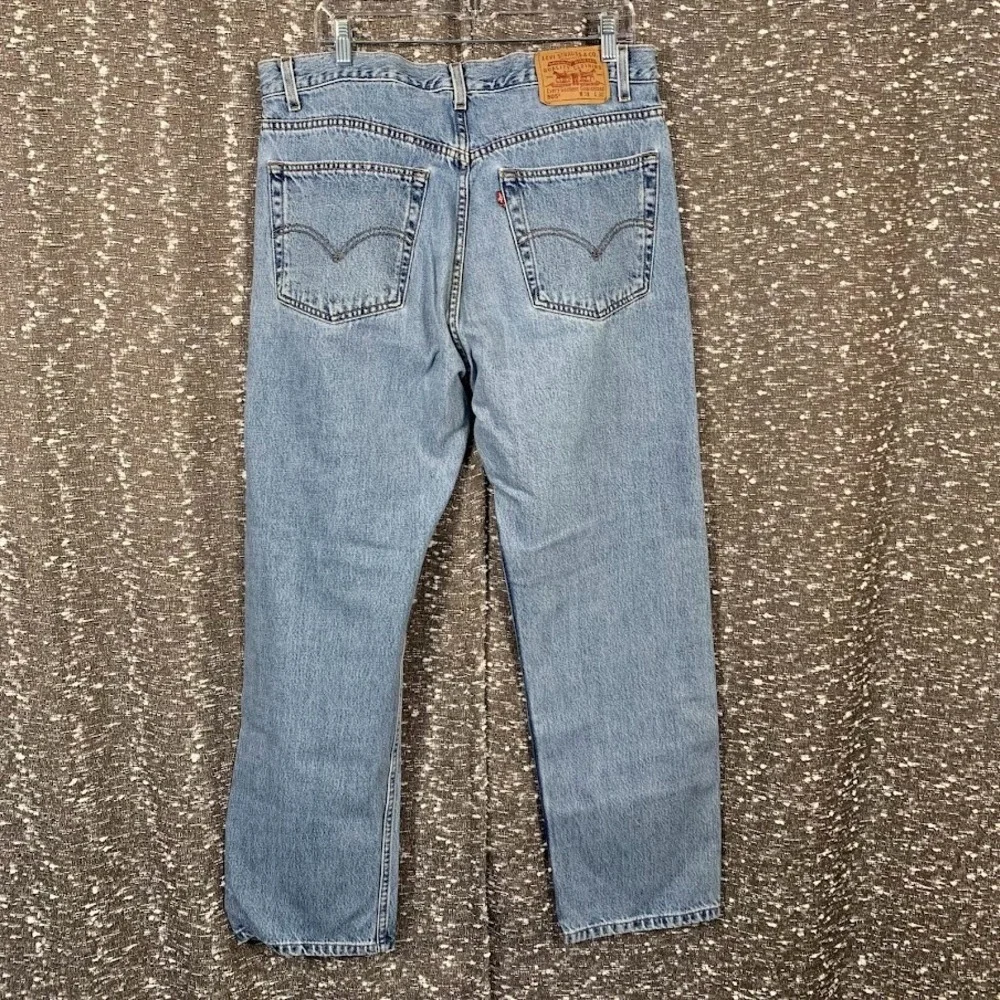 Levi's 505 Regular Fit Straight Leg Light Wash Denim Blue Jeans Men's 38x30‎